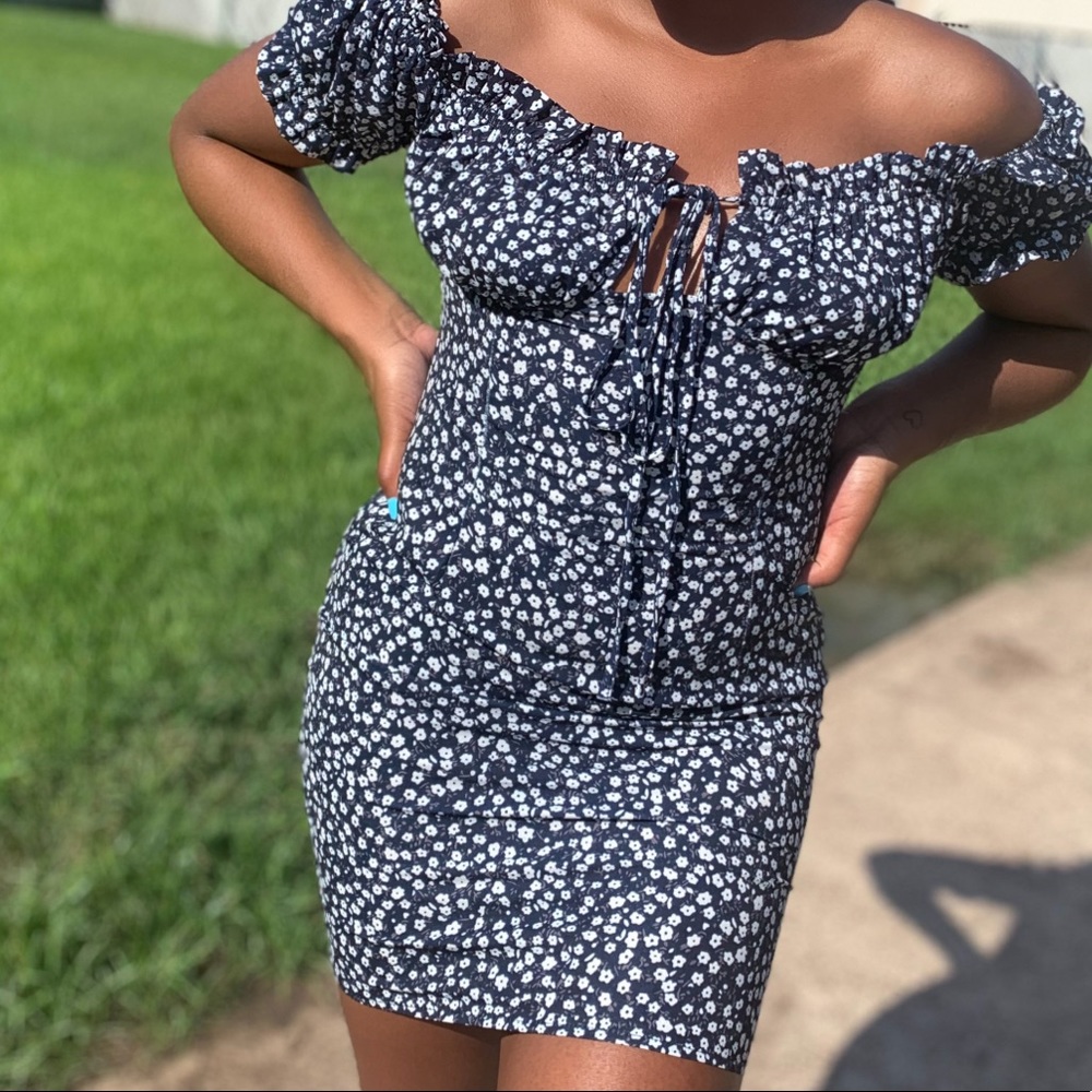 A mini off the shoulder dress.